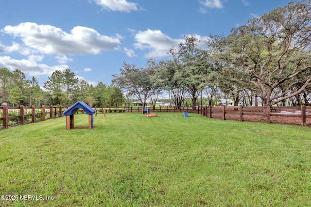 view of yard featuring fence