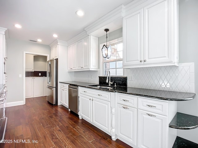 kitchen featuring sink and white cabinetry