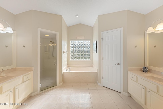 bathroom with vanity, tile patterned flooring, plus walk in shower, and lofted ceiling