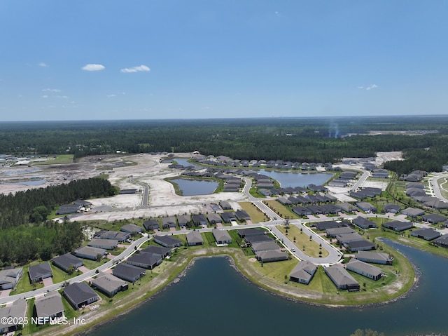 aerial view featuring a water view and a residential view