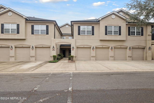 view of property featuring a garage