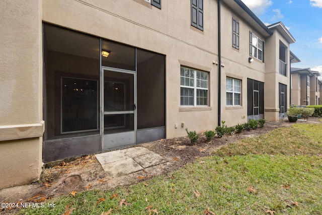 exterior space with a lawn