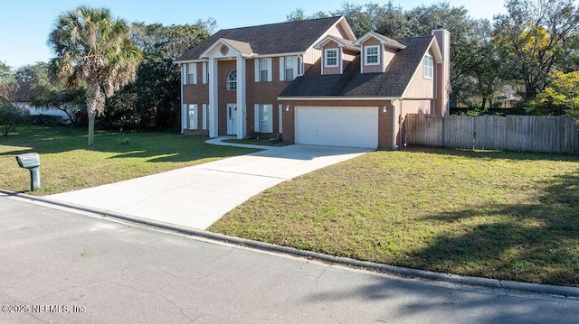 view of front of property featuring a garage and a front lawn