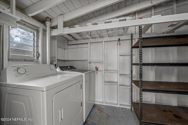 laundry area with washing machine and dryer