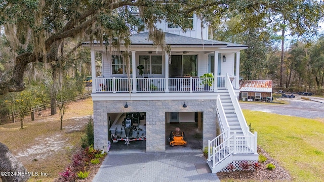 view of front facade with covered porch and a front lawn