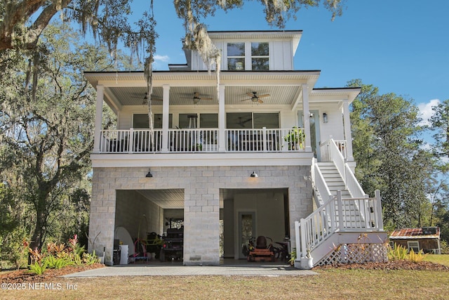 rear view of property with ceiling fan