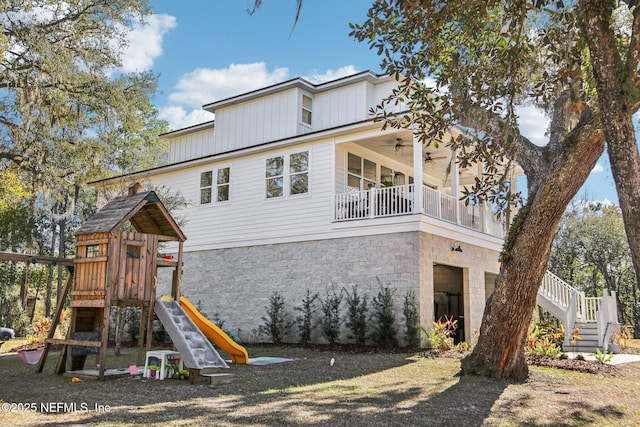 exterior space with ceiling fan