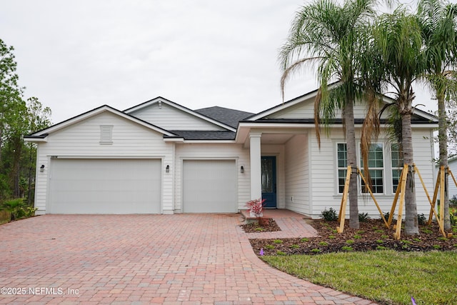 view of front of home with a garage