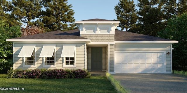 view of front facade with driveway, a front lawn, and an attached garage