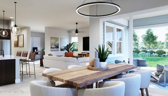 dining space with ceiling fan