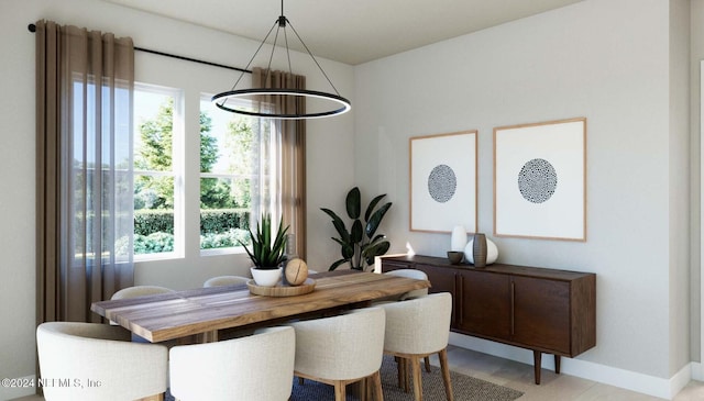 dining room featuring a notable chandelier