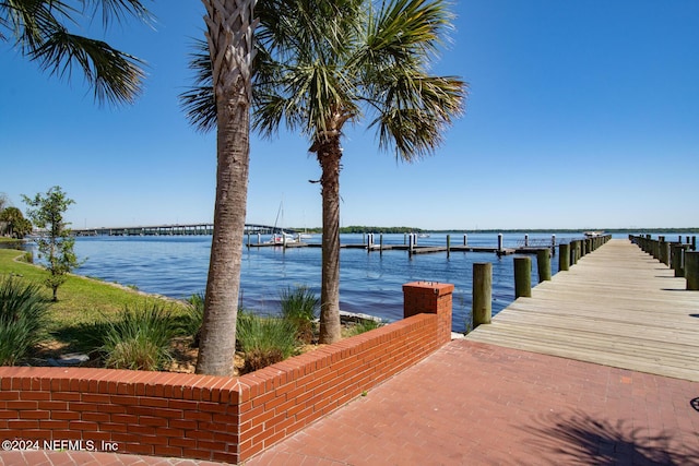 dock area featuring a water view