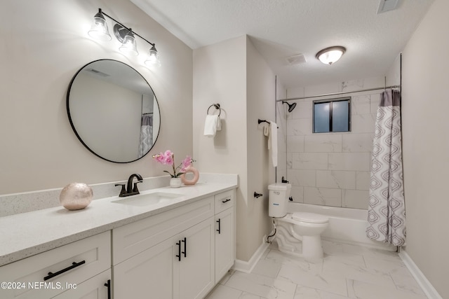 full bathroom with vanity, shower / bath combo, a textured ceiling, and toilet