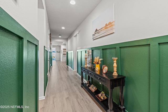 corridor featuring light wood-type flooring