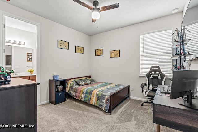 carpeted bedroom with ceiling fan and multiple windows