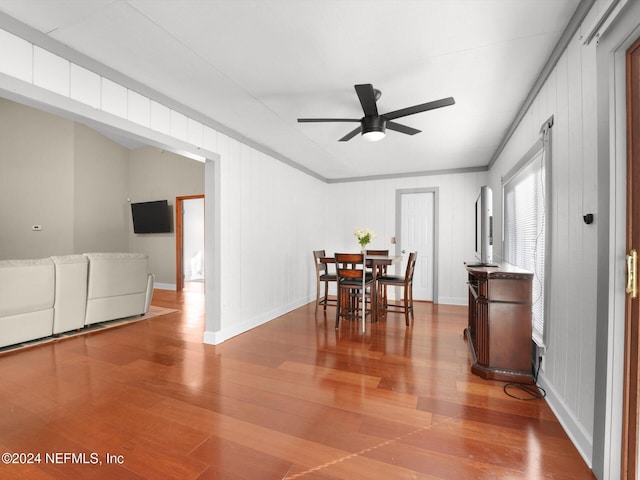 dining space featuring ceiling fan and wood-type flooring