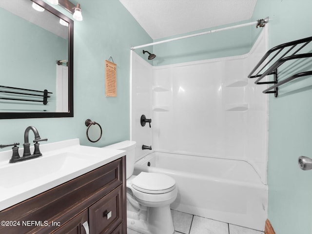 full bathroom featuring vanity, bathtub / shower combination, tile patterned flooring, toilet, and a textured ceiling