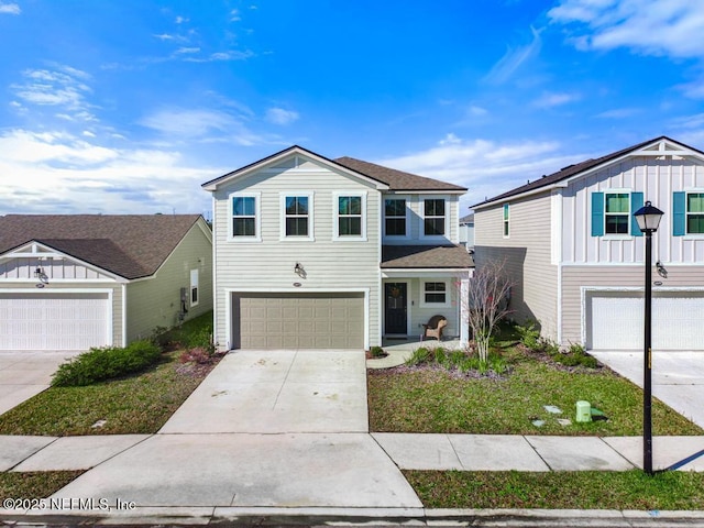 view of front of property featuring a garage