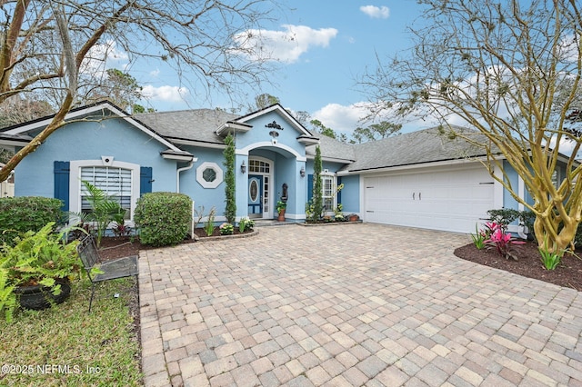 view of front of home featuring a garage