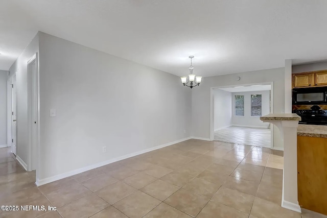 interior space featuring light tile patterned flooring and a notable chandelier