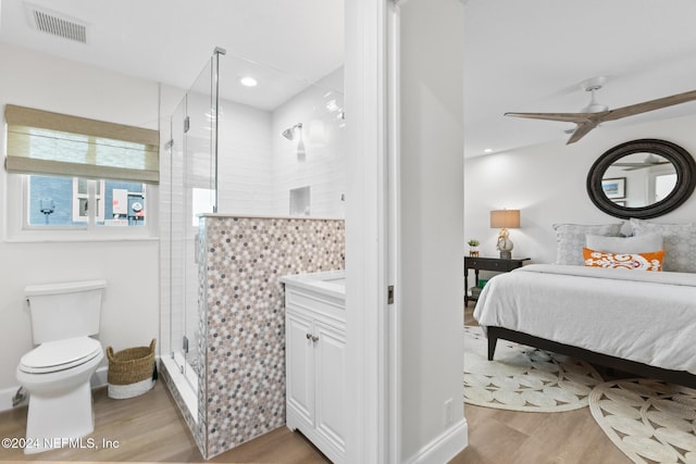 bedroom featuring ceiling fan and light hardwood / wood-style flooring