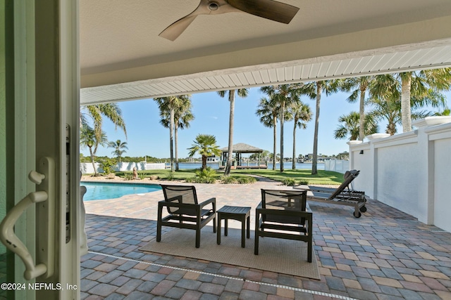 view of patio / terrace featuring a gazebo and ceiling fan