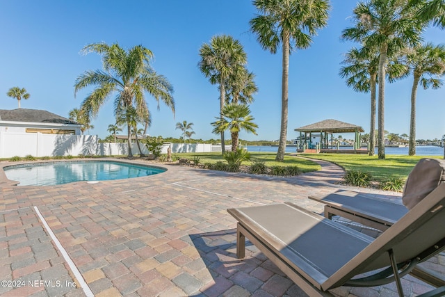 view of swimming pool with a gazebo and a patio