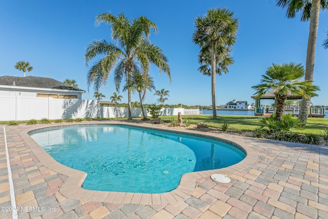 view of swimming pool with a patio area