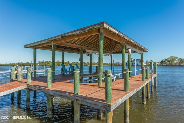 dock area featuring a water view