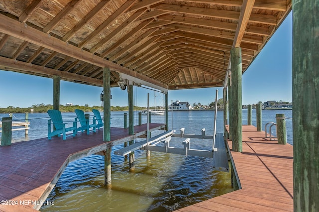 dock area featuring a water view