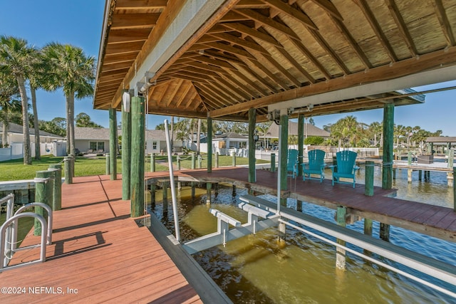 dock area with a water view