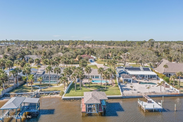 drone / aerial view with a water view