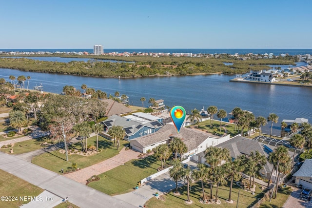 drone / aerial view with a water view