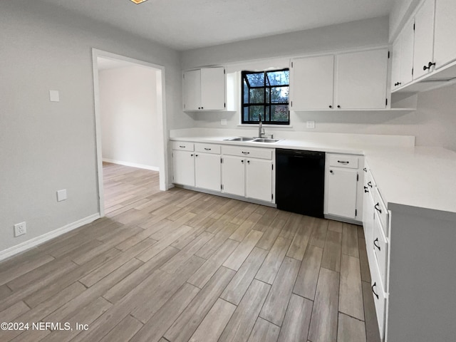 kitchen with dishwasher, light hardwood / wood-style floors, white cabinetry, and sink