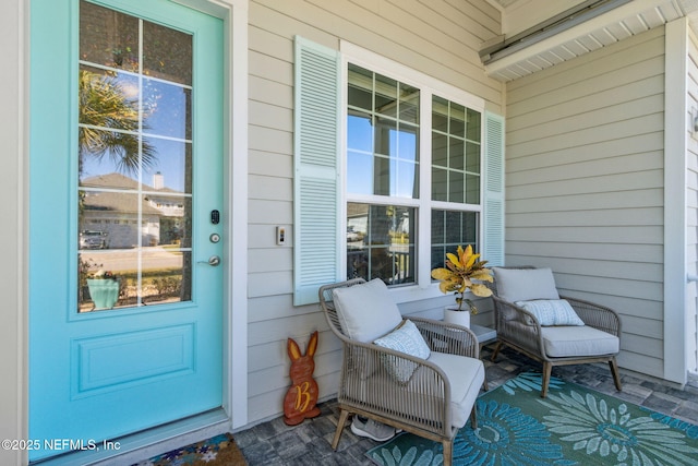 property entrance featuring covered porch