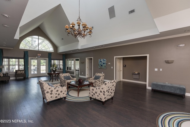 living room with high vaulted ceiling, a chandelier, dark hardwood / wood-style flooring, and french doors