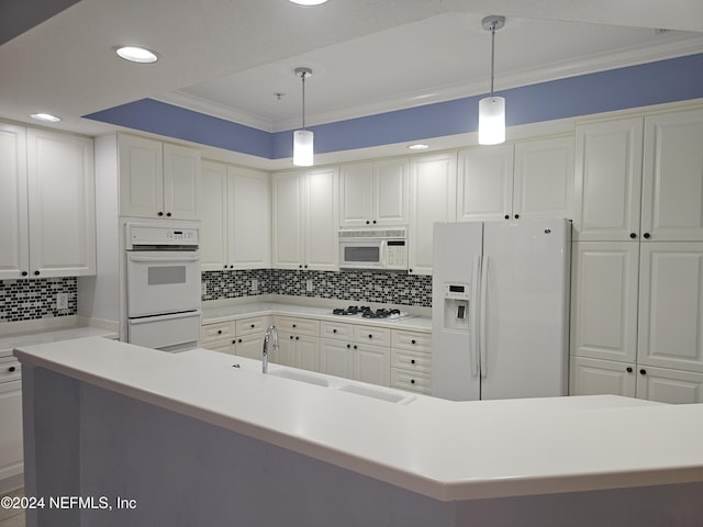 kitchen with tasteful backsplash, ornamental molding, white appliances, pendant lighting, and white cabinetry