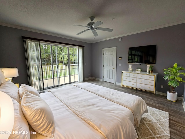 bedroom with ceiling fan, dark hardwood / wood-style floors, ornamental molding, a textured ceiling, and access to outside