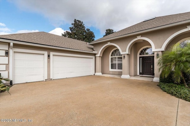 view of front of house with a garage