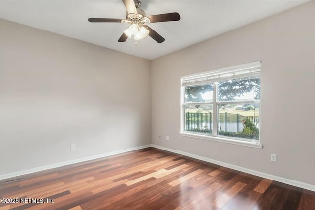 spare room featuring ceiling fan and wood-type flooring