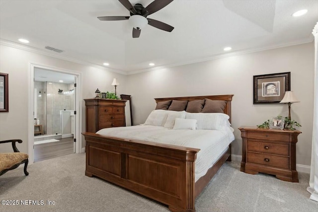 bedroom with light colored carpet, ensuite bath, ceiling fan, and ornamental molding