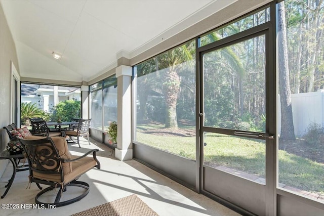 sunroom with lofted ceiling