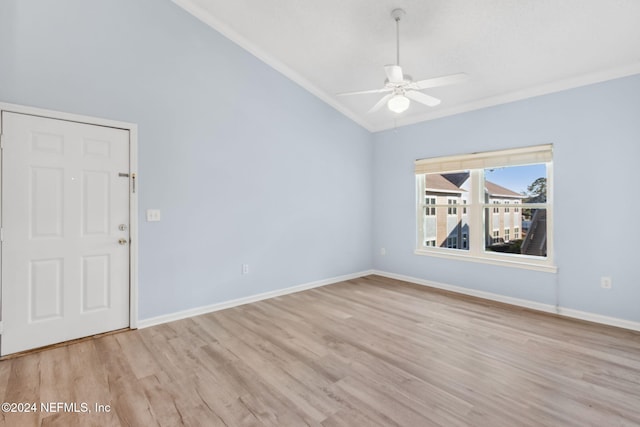 spare room featuring ceiling fan, light hardwood / wood-style floors, and crown molding