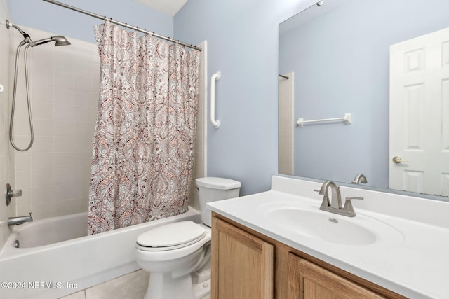 full bathroom with vanity, shower / bath combination with curtain, and toilet