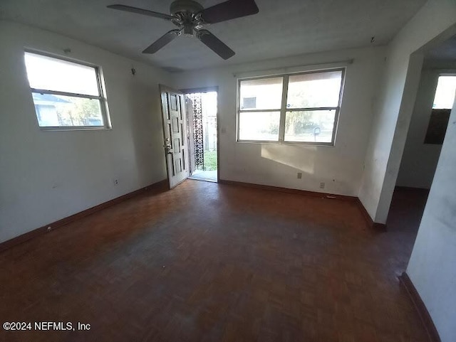 unfurnished room with ceiling fan