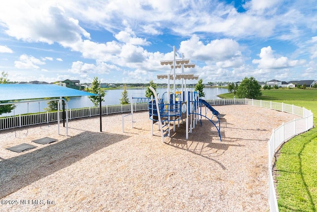 view of jungle gym featuring a water view