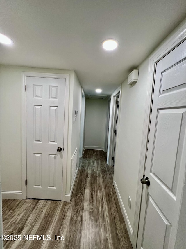 hall featuring dark hardwood / wood-style floors