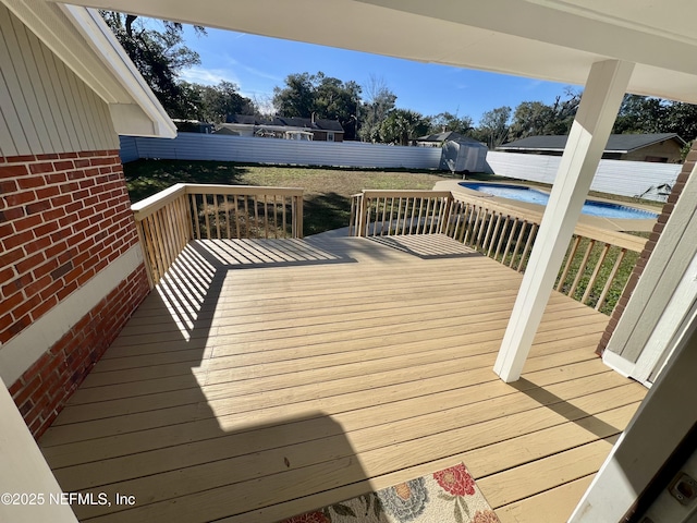 wooden deck with a storage unit