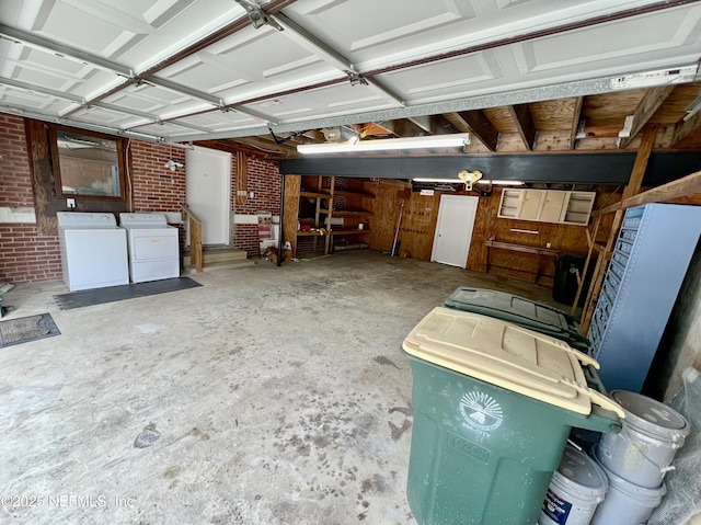 garage featuring washer and clothes dryer