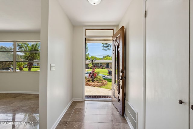 view of tiled foyer entrance